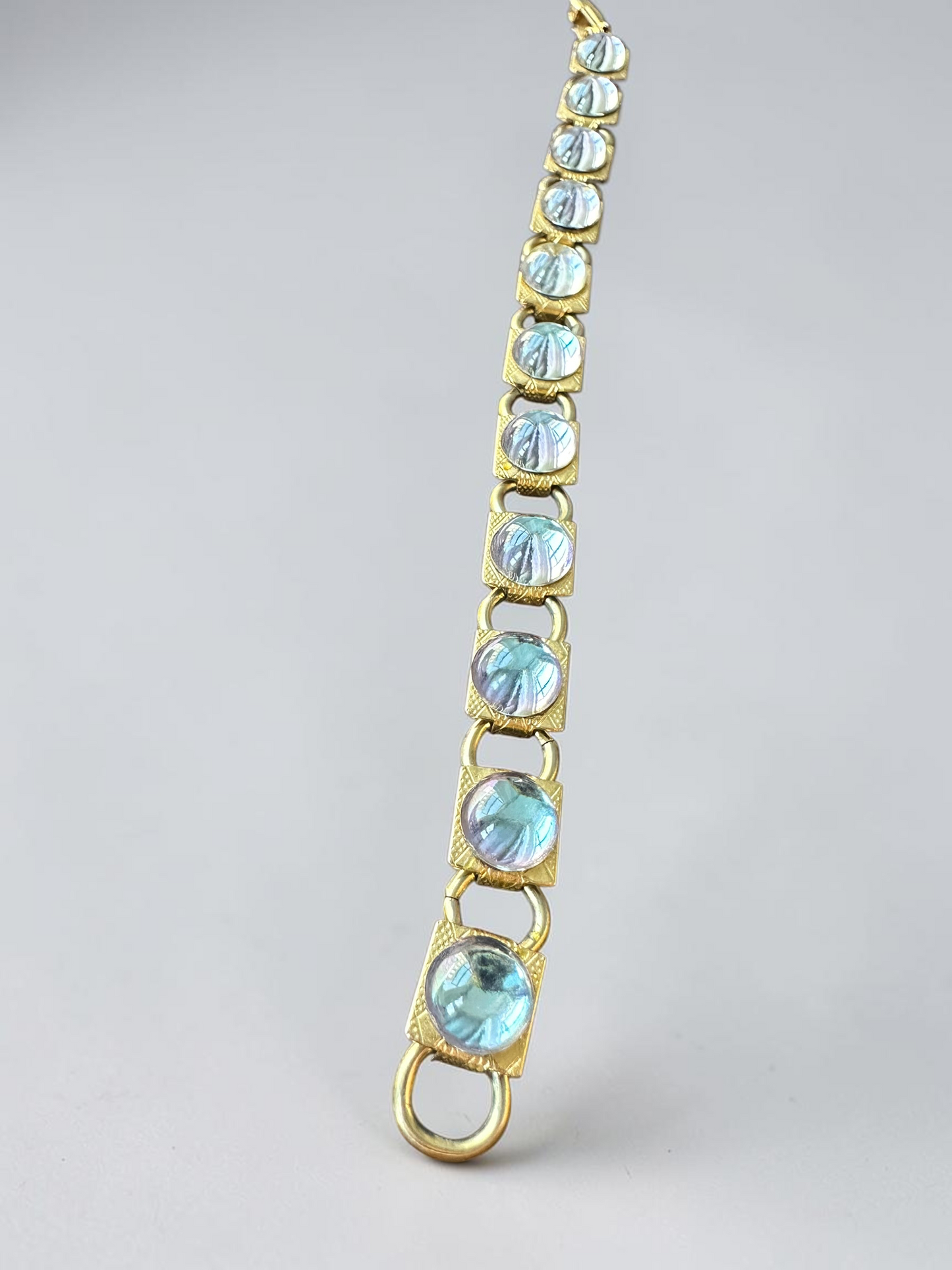 Vintage aqua glass cabochon gold tone link bracelet, close-up detail