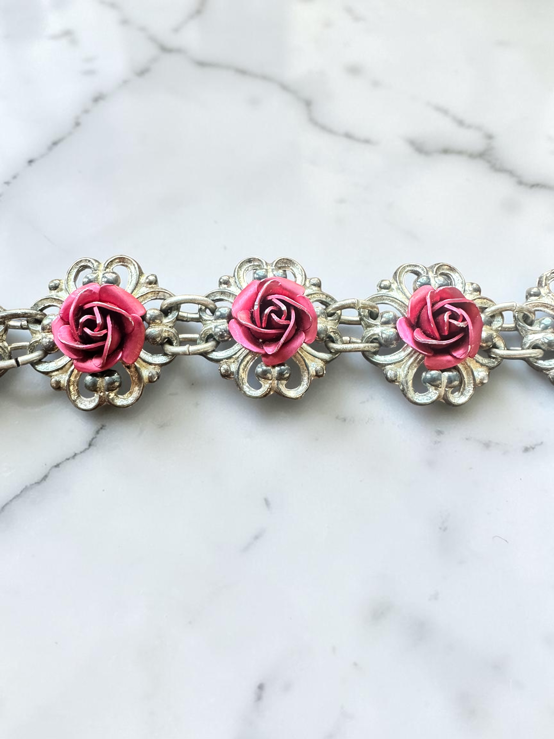 Vintage pink rose silver tone filigree link bracelet, close-up of rose detail
